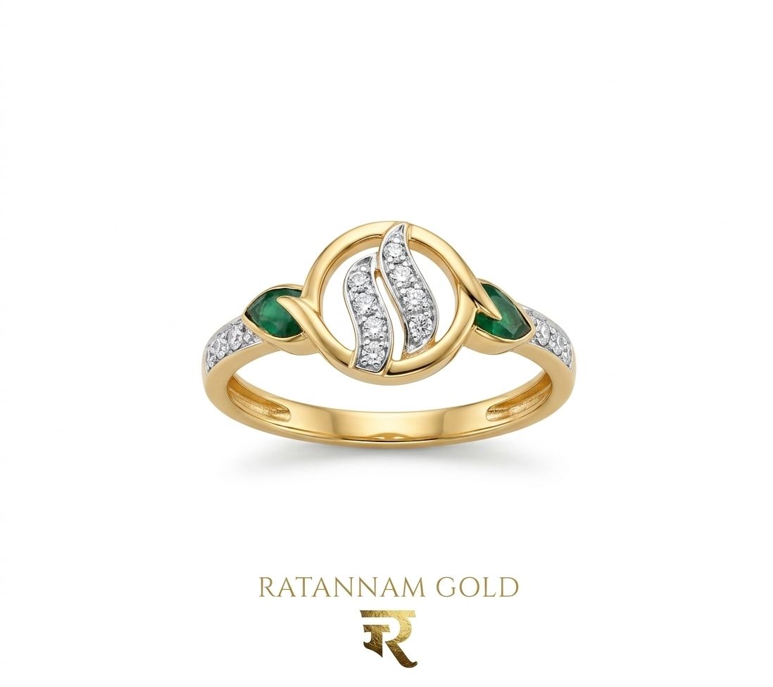 Elegant Gold Ring with Diamond Detailing and Green Gemstone Accents